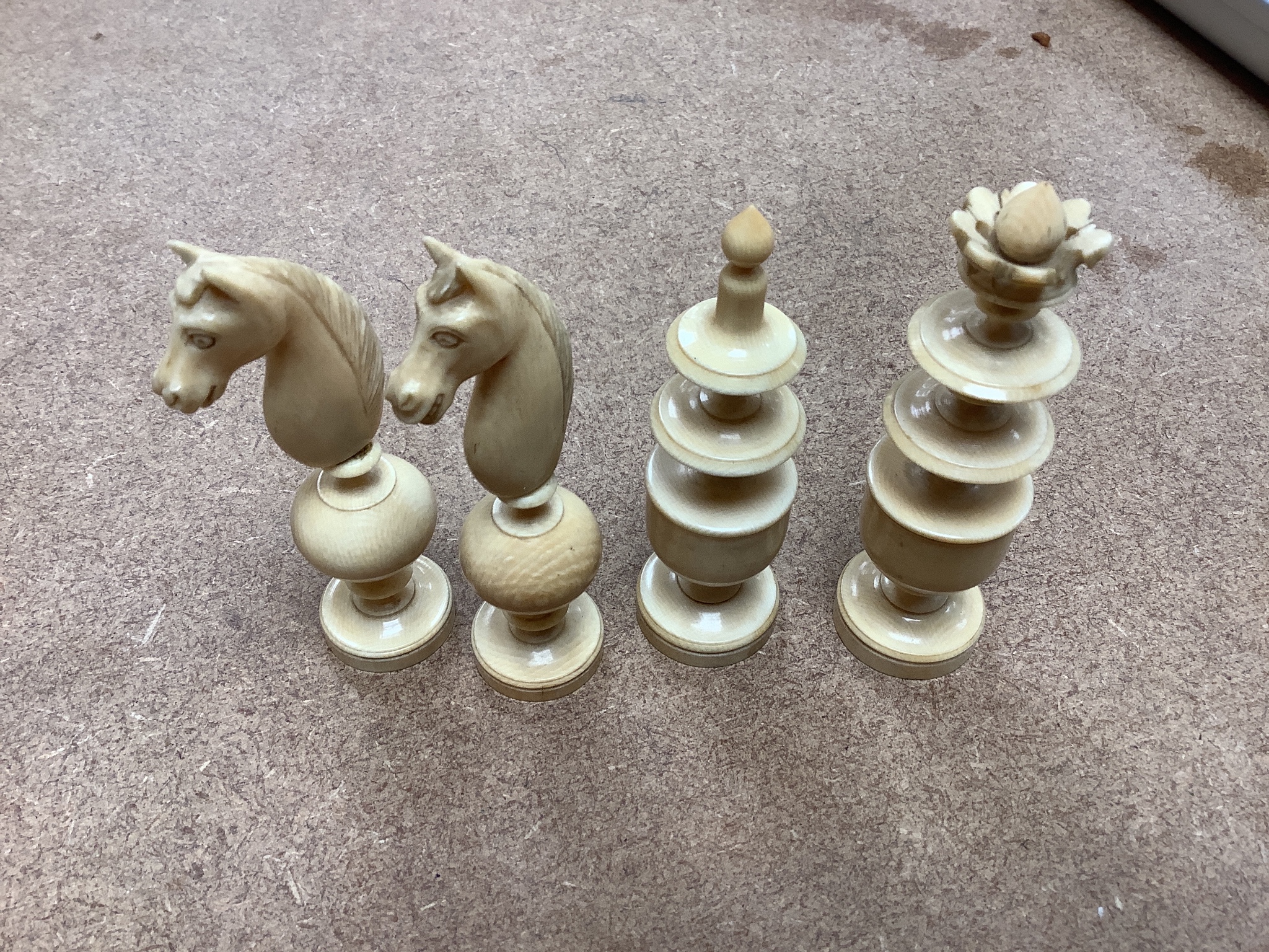 A group of 19th century ivories, fans and chess pieces, etc.